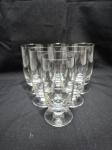 Jogo de 6 taças longas de vinho em cristal incolor com pé disco. Medindo 6cm x 14cm de altura.