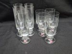 Jogo de 10 taças em cristal Prado com pé disco, sendo 5 longas e 5 de vinho. Medindo 5,5cm x 11,5cm de altura; 5cm x 15,5cm de altura.