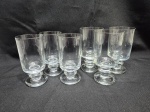 Jogo de 6 taças em cristal Prado com pé disco, sendo 3 de vinho tinto e 3 de vinho branco. Medindo 6cm x 12,5cm de altura; 7cm x 13,5cm de altura.