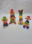Lote de 4 enfeites na forma de palhaço em biscuit. Medindo o maior 10,5cm de altura.