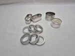 Lote de 10 arogolas de guardanapo em metais diversos. Medindo a maior 5cm x 3,5cm de altura.