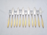 Jogo de 12 talheres de peixe em aço inox Hercules Gelodur com pega dourada. Medindo garfo 17cm de comprimento, faca 20cm de comprimento.