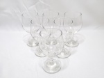 Jogo de 6 taças de vinho em vidro incolor. Medindo 5,5cm x 13cm altura.