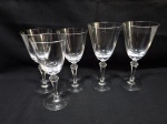 Jogo de 4 taças em cristal Strauss com pé facetado. Medindo o maior 8cm x 17,5cm de altura.