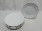 Jogo de 6 pratos de sobremesa em porcelana branca com relevo na borda. Medindo 19,5cm de diâmetro.