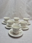 Jogo de 6 xícaras de chá em porcelana Schmidt floral. Medindo a xícara 9cm x 8cm de altura.