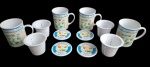 Lote contendo, 4 (quatro) lindas canecas para chá, em porcelana, ornado com decoração de flores de camomila. Sem uso na caixa original. VEJA FOTO EXTRA.
