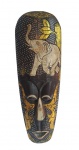 Máscara decorativa em madeira entalhada, decorada com detalhes dourado representando elefante, símbolo comum de inteligência, boa sorte e prosperidade, na cultura balinesa. Medidas: 49x16cm.