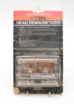 TDK Head Demagnetizer HD-01, acessório para restauração de desempenho e redução de ruídos em equipamentos de fita. Acompanha embalagem original, Marcas do tempo. Made in Japan.  Não testado. 11x8 cm