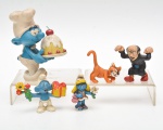 Lote contendo 5 pequenos brinquedos em plastico rígido do desenho OS SMURFS. 11X8 cm (MAIOR)