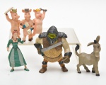 Lote contendo 4 pequenos brinquedos em plastico rígido do desenho SHREK. 7X6 cm (MAIOR)