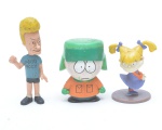 Lote contendo 3 pequenos brinquedos em plastico rígido de desenhos distintos sendo: Beavis and BUTT-HEAD, RUGRATS e SOUTH PARK. 9X4 cm (MAIOR).