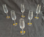 Cristais Strauss, seis flutes medindo 23 cm de altura por 5,5 cm de diâmetro