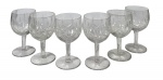 Lote com 6 taças de cristal lapidado e espesso, estilo vintage. Bojo decorado com lapidação geométrica em padrão losango/diamante cruzado e haste robusta. Marcas do tempo. -dim- 6d x 11a.