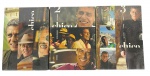Coleção completa (3 Box Sets) de 9 DVDs `Chico A Série / Box Set Volumes 1, 2 e 3 - Chico Buarque`, em plástico original de fábrica (lacrados) e em excelente estado de conservação.  