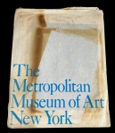 Impressão da obra `The Brioche` de Édouard Manet, pertencente ao acervo do Metropolitan Museum of Art de Nova York, acompanhada do seu envelope original. Marcas do tempo.
