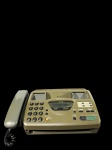Aparelho de fax Panasonic KX-FT22BR, modelo antigo, em estado de conservação razoável, sem teste de funcionamento.
