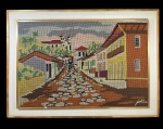 Tapeçaria de ponto cruz assinada `Joselita`, com moldura, representando uma cena de rua de uma cidade histórica brasileira. -dim- 102x73