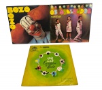 Lote 3 LPs Infantis Clássicos: Bozo (1982) RCA, Os Abelhudos - O Dono da Terra (1985) Som Livre e 23 Cantigas de Roda (Carroussell, vinil colorido), itens icônicos da cultura pop e musical brasileira dos anos 80.