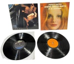 Lote com 2 LPs em vinil, incluindo George Michael - `Faith` e Percy Faith & André Kostelanetz - `& os Sucessos`. Condição geral boa, marcas do tempo.