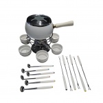 Aparelho para fondue completo com estrutura giratória 6 bowls para molho em cerâmica branca 6 garfos espetos, 6 conchas e fogareiro, panela: Alt. 10, Diam. 8 cm. Base giratória Diam. 34 cm.