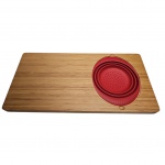 Tábua de corte com escorredor de silicone, em sua embalagem original, 59 x 30 cm.