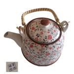 Bule oriental em cerâmica policromada com coador para o chá, Diam. 11, Alt. 13 cm.