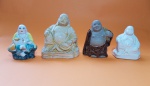 Bonita coleção com 4 Budas, sendo: Buda da Felicidade, em porcelana, com  bonita policromia, 9 X 7,5 cm - Buda sorridente em gesso pedra, apresenta leves marca de uso, 11 X 10 cm - Buda sorridente em cerâmica esmaltada, 10 X 7 cm - Buda sorridente em porcelana branca, 8,5 X 7 cm - Vide fotos!