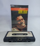 Fita K7  -  O MELHOR DE EMILIO SANTIAGO  -  EMILIO SANTIAGO - ELENCO - 1989  -  ESTÉREO  . Medida: 11 cm x 7 cm x 2 cm. Conforme fotos.