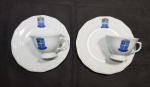 Par de xícaras de porcelana com brasão - Astúrias Principado Louças - Schmidt - Xícaras: 7 X 10 cm - Pires: 19,5 cm - Pires por ser grande, também faz papel de prato de sobremesa!