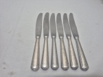 Jogo de 6 facas de mesa em prata 90 Wolff, modelo grego. Medindo 24cm de comprimento. Necessita de limpeza.