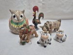 Lote de 6 enfeites na forma de animais, em metal, porcelana e barro. Medindo o maior 12cm de altura.