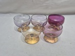 Jogo de 5 taças abertas em cristal colorido. Medindo 6,5cm x 5,5cm de altura.