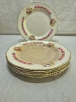 Jogo de 6 pratos rasos de mesa em faiança Inglesa, floral com friso ouro. Medindo 23cm de diâmetro. Peças com manchas.