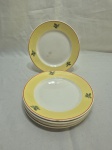 Jogo de 6 pratos de sobremesa em porcelana Nadir, borda amarela e friso ouro. Medindo 18,5cm de diâmetro.