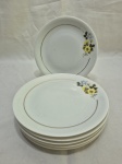 Jogo de 6 pratos de sobremesa em porcelana Renner Medaillon flor amarela e friso ouro. Medindo 18cm de diâmetro.