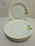 Jogo de 6 pratos rasos de mesa em porcelana Renner Medaillon flor amarela e friso ouro. Medindo 25cm de diâmetro.