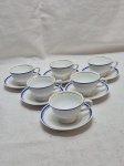 Jogo de 6 xícaras de café em porcelana Real, barra azul com ouro. Medindo 7cm x 4,5cm de altura.