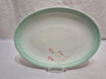 Lina travessa oval em faiança Eugênio década de 60. Medindo 30cm x 22,5cm.