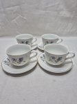 Jogo de 4 xícaras de chá em porcelana Steatita floral com friso ouro. Medindo 9cm x 6cm de altura.
