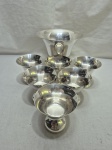 Jogo de taça de servir com 6 taças de sobremesa em prata 90 Wolff. Medindo o maior 18,5cm x 16cm de altura, cumbuca 9,5cm x 9,5cm de altura.