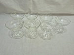 Lote de 7 taças abertas em cristal lapidado, modelos diversos. Medindo o maior 9cm x 10,5cm de altura.