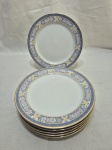 Jogo de 6 pratos de sobremesa em porcelana Germer com barra azul floral. Medindo 20,5cm de diâmetro.