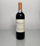 Vinho português Batuta Douro, safra 2009, de alta gama da região do Douro. Garrafa de 750 ml, com rótulo característico em relevo e sinais de desgaste naturais pelo tempo. Perfil encorpado, complexo e estruturado.