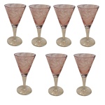 Sete taças para licor em cristal rosa com haste base translúcida, Alt. 10, Diam. 5 cm.Escultório em cerâmica representando elefante, leve bicado na tromba, 12x 27 Alt. 17 cm.