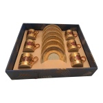 Seis xícaras para café com pire em porcelana decorada com rosas sobre fundo dourado, em sua embalagem original, 5 x 5 cm.