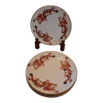 Seis pratos para sobremesa e 1 para bolo em porcelana Condessa, com policromia representando dragões, Diam. 19 e 26  cm.