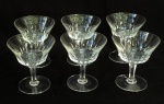 CRISTAL, seis (6) taças de pé alto para champanhe ou espumante, incolores e translúcidas, bojo com lapidação dita dedão, fuste hexagonal, base em bolacha, medindo 11,5 cm altura e 10 cm diâmetro, sinais de uso, vide foto.