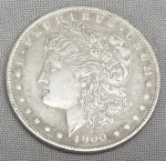 NUMISMÁTICA, USA, uma (1) réplica da moeda de 1 dólar, 1900 S, 38mm diâmetro, confeccionada em metal prateado, popularmente conhecida como MORGAN, designer George T. Morgan.