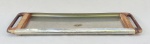 AÇO INOX, uma (1) bandeja retangular oblonga, alças em madeira, selo da marca FORMA, medindo 45,5 x 14 cm, sinais de uso.